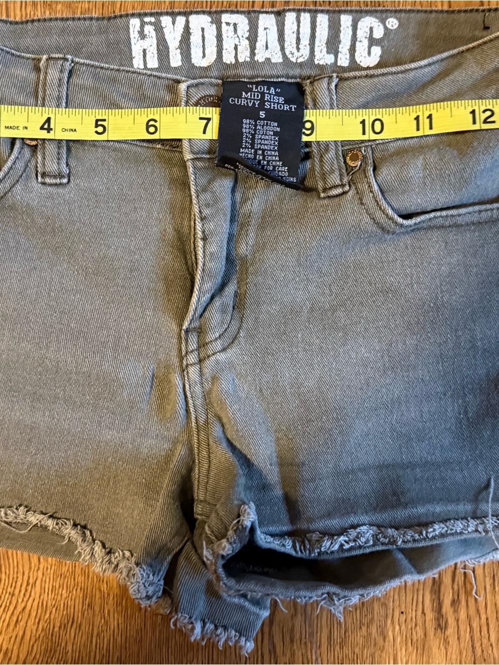Hydraulic Olive Green Frayed Denim Shorts